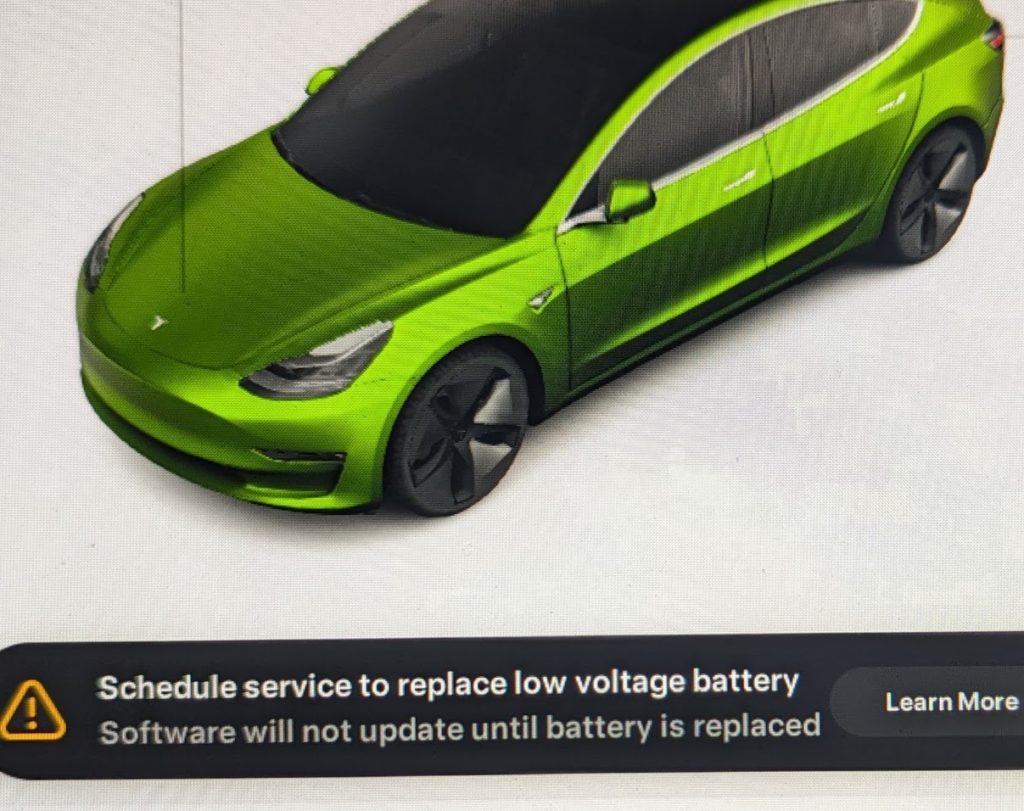 Tesla low voltage battery warning